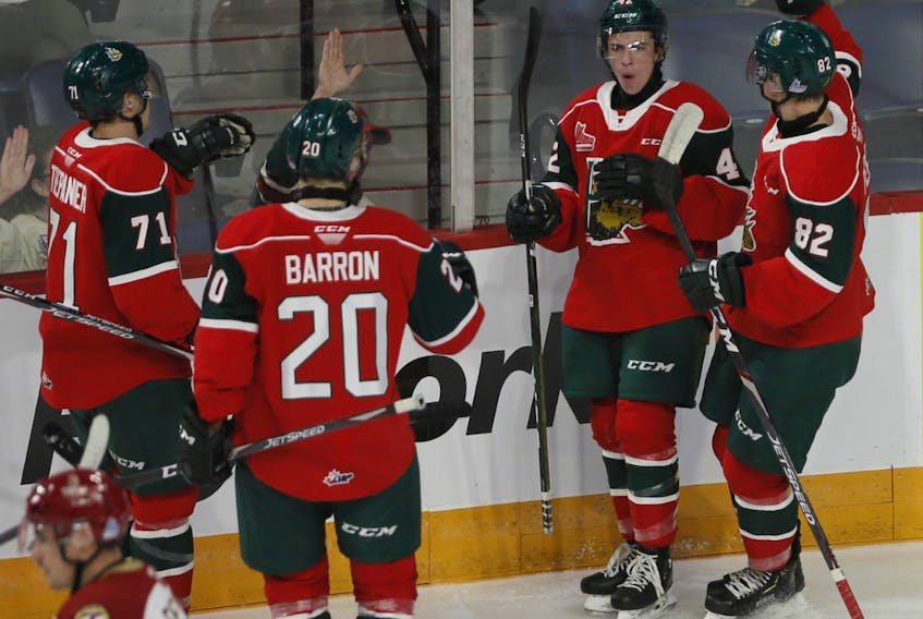 Halifax Mooseheads forward Zack Jones, second from right, celebrates with teammates following his first period goal against the Bathurst Titan Saturday night at the Scotiabank Centre. (TIM KROCHAK/ The Chronicle Herald)