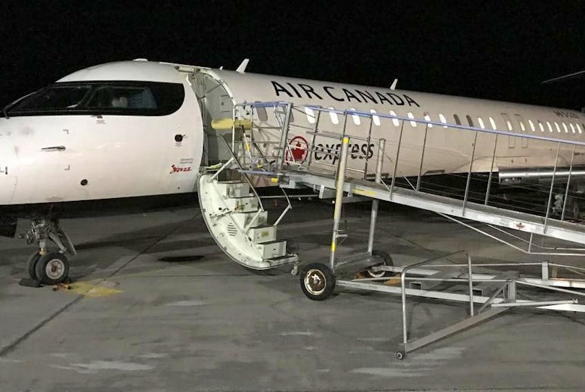 This Air Canada plane at the J.A. Douglas McCurdy Sydney Airport, early Monday morning was the last commercial flight to leave the facility. Air Canada has suspended operations indefinitely. Contributed • Sydney Airport Authority