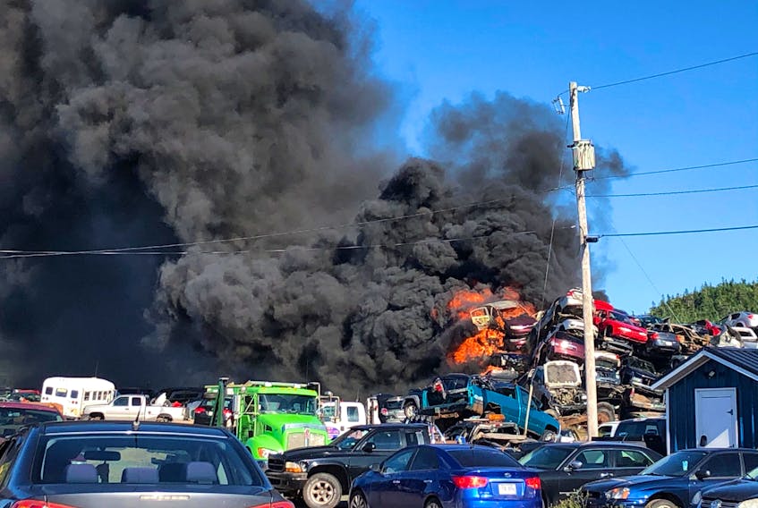 Thursday's fire at Rene's Auto Body in Burin destroyed over 1,000 vehicles destined for recycling. — CONTRIBUTED