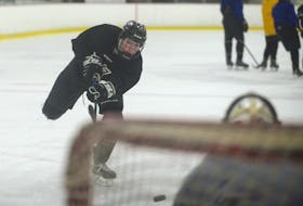 Mount Academy Saints defenceman Aiden Diamond, a Stratford native, fires a shot on goal during Tuesday’s practice at MacLauchlan Arena.