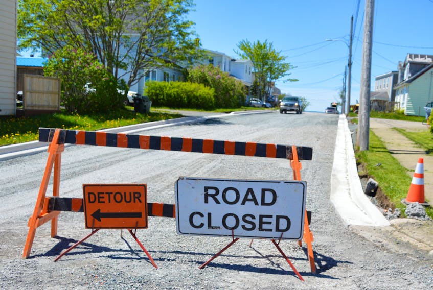 A “road closed” sign is generally good news for residents of a shut down street. Above, Webster Street in Sydney’s Whitney Pier neighbourhood is one of 27 streets across the municipality that are being paved this year. DAVID JALA/CAPE BRETON POST