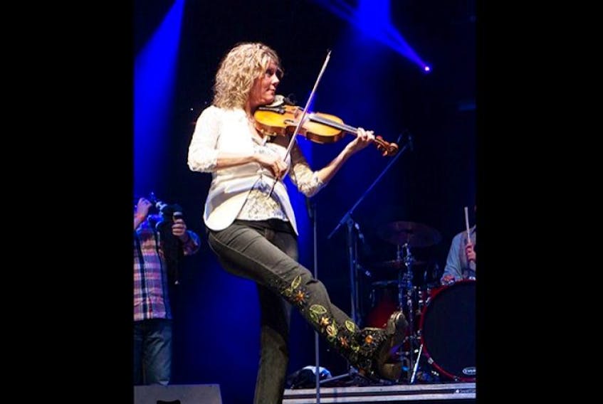 Cape Breton fiddler Natalie MacMaster kicks up her heels during her concert at the P.E.I. 2014 Celebration Zone Friday night, July 4, 2014.&nbsp;