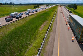Traffic was backed up for kilometers at the main border crossing between Nova Scotia and New Brunswick when restrictions went into place this summer. The border will reopen again at 8 a.m. on Saturday, March 20, 2021. - Aaron Beswick / File