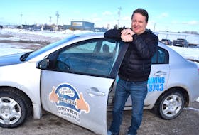Dave LeBlanc of New Waterford, stands by one of his vehicles as part of his new business, Signature Driving School, by Safety Check Inspections Ltd. LeBlanc said the pandemic took a big bite out of his food truck business and he had to reinvent himself. Sharon Montgomery-Dupe/Cape Breton Post

