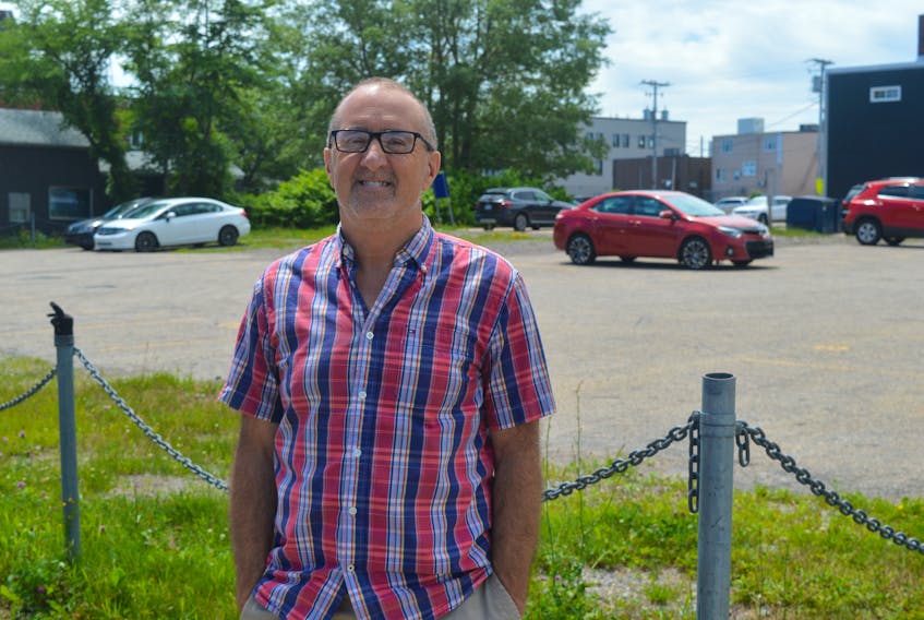 Craig Boudreau, owner of J. Francis Investments Ltd., is shown in front of the former Jasper’s restaurant property at the corner of George and Dorchester streets in downtown Sydney on Wednesday. Boudreau, who purchased the property in 2018, has proposed a new commercial/residential development for the location. JEREMY FRASER/CAPE BRETON POST