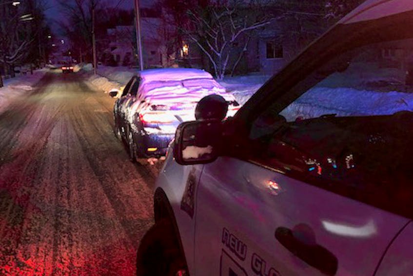 Officers with New Glasgow Regional Police conducted a traffic stop with this snow covered vehicle in the early morning hours on Jan. 20. CONTRIBUTED

