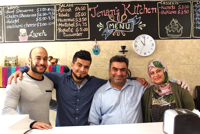 The owners of Jenan’s Syrian’s Kitchen in downtown Sydney, left to right, Ahmed Barakat and Abdullah Alhsso, along with Abdullah's parents Ahmad Alhsso and Jenan Alahmad. The restaurant offers dishes the family once served at their own large gatherings back in Syria. CAPE BRETON POST