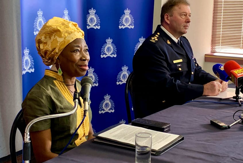 Lloydetta Quaicoe and RCMP NL Assistant Commissioner, Commanding Officer Ches Parsons speak to reporters at a news conference Friday at RCMP headquarters in St. John’s. — ROSIE MULLALEY/The Telegram