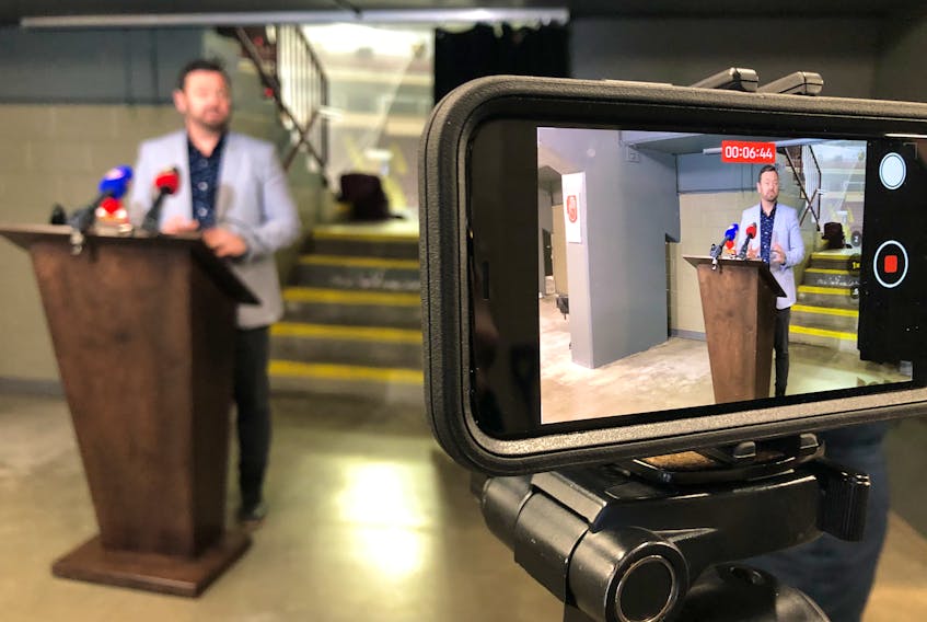 St. John’s City Coun. Jamie Korab —council lead on St. John’s Sports & Entertainment speaks to  reporters on the main concourse of Mile One Centre Wednesday.  Joe Gibbons/The Telegram