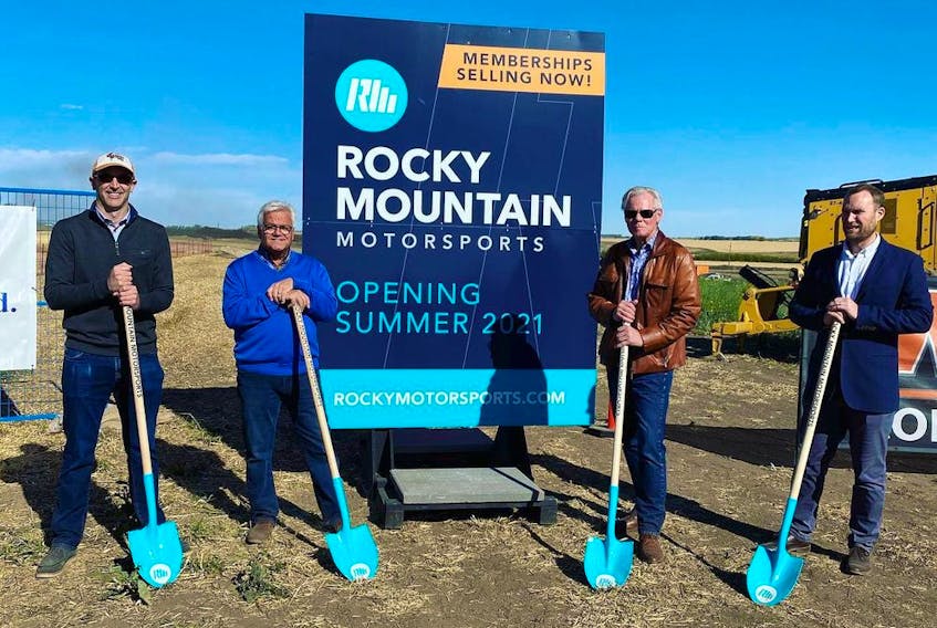 Officials break ground on the Rocky Mountain Motor Sports’ track near Carstairs on Thursday. From left, Whissell Contracting president Jarrad Whissell, founder Dan Petrin, founder and president Dominic Young and Volker Stevin Contracting general manager  James Wallace. Supplied photo