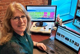 Truro and Colchester Chamber of Commerce executive director Sherry Martell checking out the new Explore Central website.  