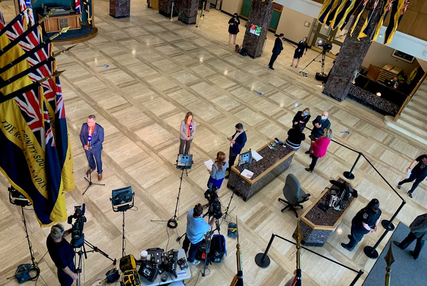Stakeholders share their thoughts with media in the main lobby of the Confederation Building in St. John's Wednesday afternoon following the release of the 2020 provincial budget for Newfoundland and Labrador. — Andrew Robinson/The Telegram