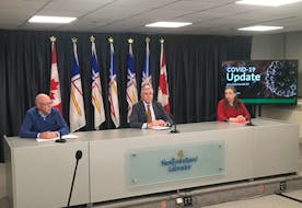 From left, Health Minister John Haggie, Premier Dwight Ball, and Chief Medical Officer Dr. Janice Fitzgerald brief reporters in St. John's Wednesday on the latest COVID-19 developments.