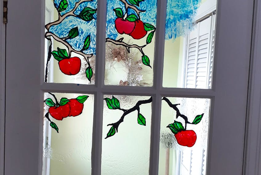 Denise Howlett of Mount Pearl is using her time at home during the COVID-19 pandemic to try a stained glass technique for her French doors. — CONTRIBUTED