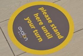 Last year, the Avalon Mall installed signage and floor decals with instructions or warnings to help shoppers.  — Telegram file photo