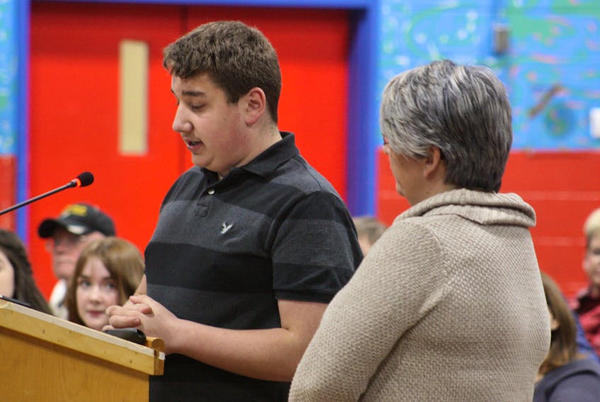 Spencer Collins, a 14-year-old student at Pearce Junior High School who has autism, was among the presenters at a public meeting held Monday, March 2 by the Newfoundland and Labrador English School District’s board of trustees at Marystown Central High School. The Grade 9 student’s mother, Wanda Collins, also spoke. The board will vote later this month on whether to close Pearce. PAUL HERRIDGE/THE SOUTHERN GAZETTE