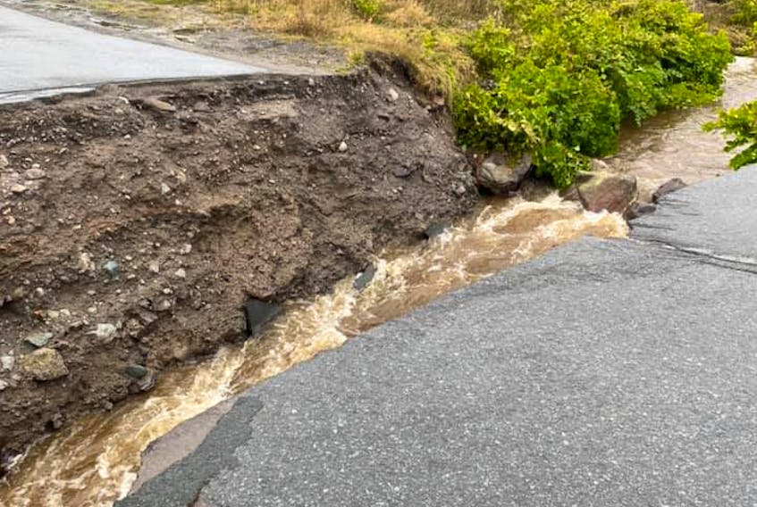 The Town of Placentia said on its Facebook page that heavy rainfall caused significant damage to a number of areas throughout the town. The town posted this photo showing a washed-out section of road. -TOWN OF PLACENTIA/FACEBOOK