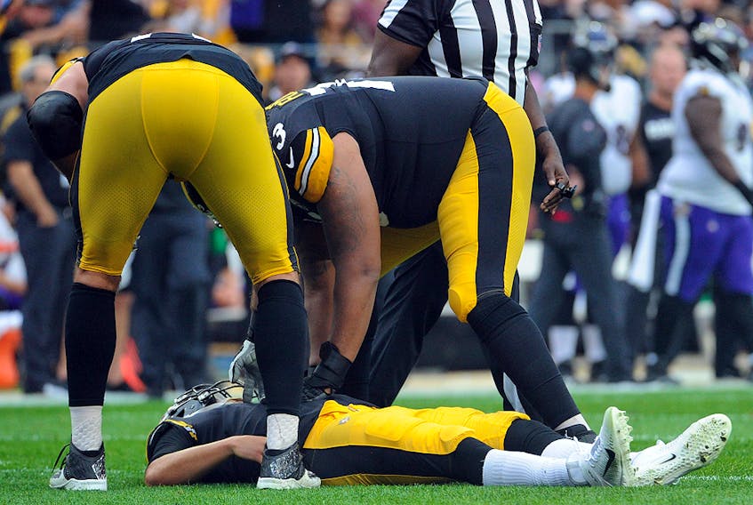 Pittsburgh Steelers quarterback Mason Rudolph (2) lays on the grass after a hit by the Baltimore Ravens defence at Heinz Field. (Philip G. Pavely-USA TODAY Sports)