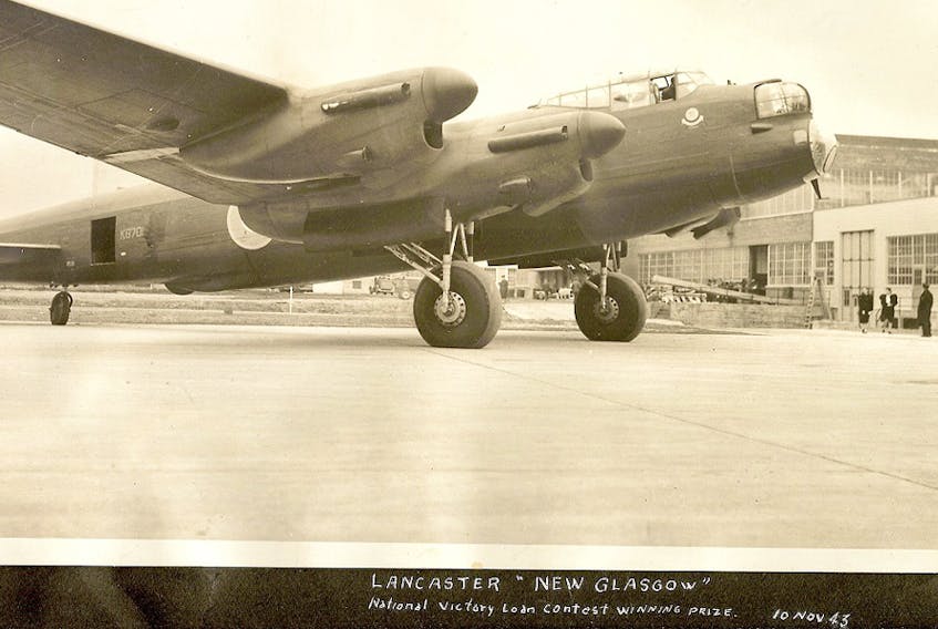 A Lancaster bomber with the New Glasgow logo on it is unveiled Nov. 10, 1943.
