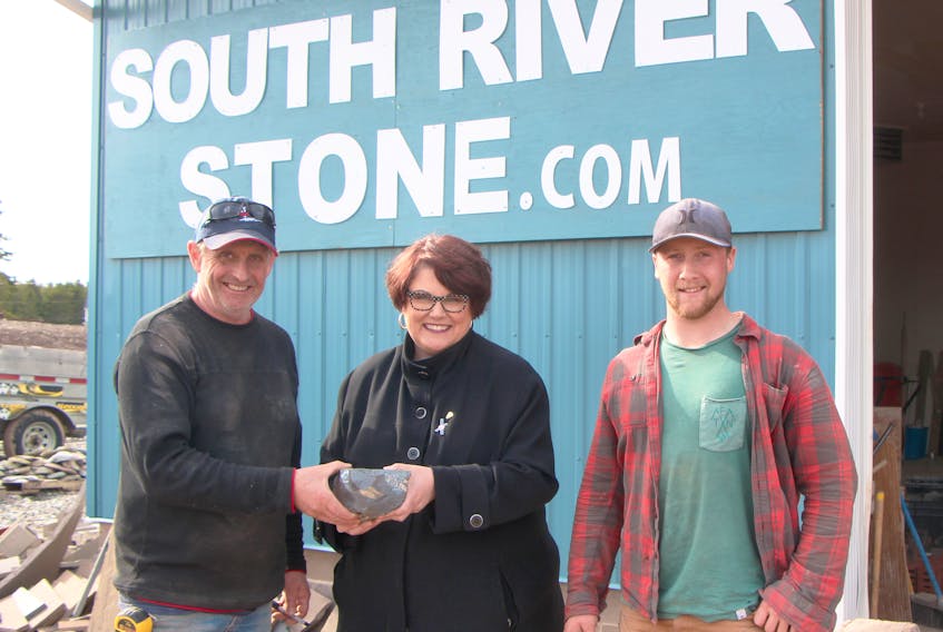 Town of Antigonish Councillor Mary Farrell pictured with Francis Arsenault and his son Matthew, from South River Stone. Farrell is in charge of the opening and closing ceremonies for the Special Olympics Canada 2018 Summer Games and a special project she is overseeing is the creation of a cairn, which will include stones from all over Canada, and is being constructed by the Lower South River business.