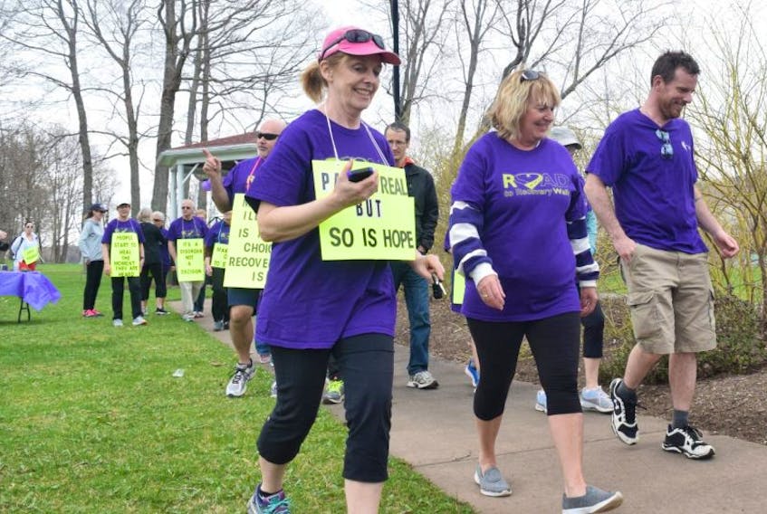 Participants with the Pictou County Road to Recovery Walk for Mental Health leave Carmichael Park on Saturday.