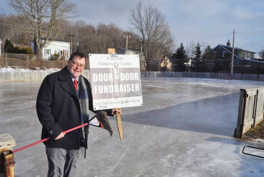 Frank Proudfoot holds a broom at the Westside Community Centre. The annual Jean MacLeod Proudfoot Memorial Broomball Challenge will be held at the Pictou County Wellness Centre on Feb. 11.