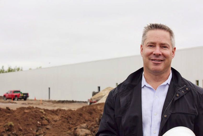 Greg Wilson in front of the Vida Cannabis facility.