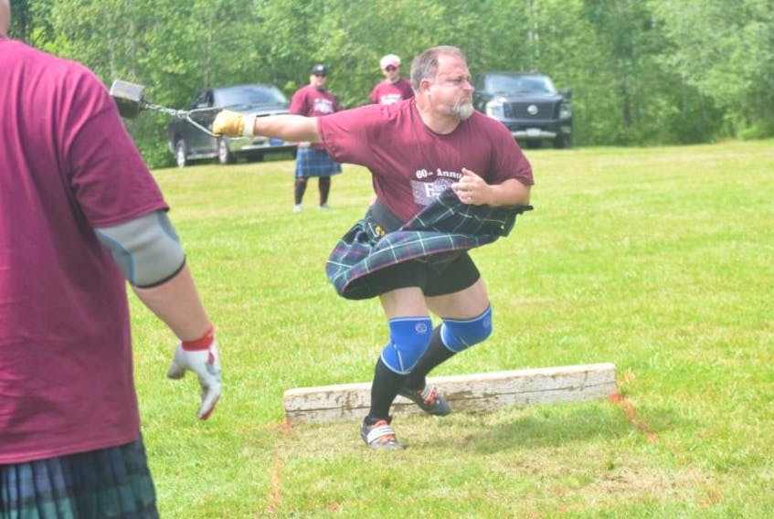Steve Young, from the Annapolis Valley, warms up for the hammer toss.