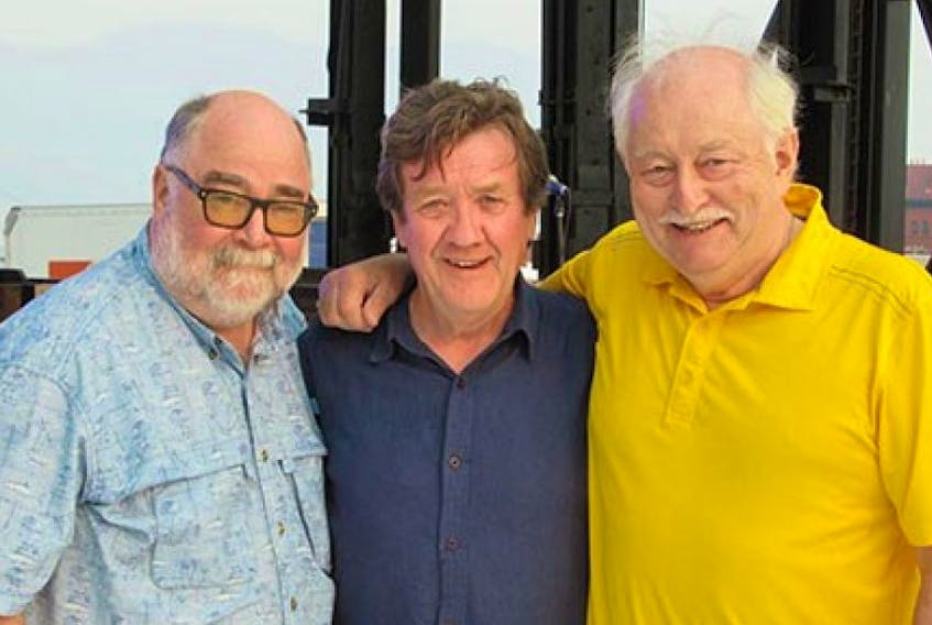 Tom Sweeney, centre, with Kevin Evans and Brian Doherty – all performers who will be paying tribute to the late Tommy Makem at the deCoste Performing Arts Centre, on Oct. 7.