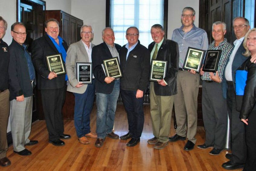 The United Steelworkers presented plaques to each of the six municipalities in Pictou County on Monday night in Stellarton, to recognize their role in endorsing the union’s campaign for better enforcement of the Westray Law. Shown are Stephen Hunt and Alain Cotreau of the United Steelworkers, VJ Earle representing Trenton, Jim Ryan representing Pictou, Clyde Fraser representing New Glasgow, United Steelworkers national director Ken Neumann, Robert Parker representing the Municipality of Pictou County, Danny MacGillivray representing Stellarton, Roger MacKay representing Westville, former Steelworkers national director Lawrence McBrearty, and Sylvia Boyce, Steelworkers’ health and safety co-ordinator for Ontario and Atlantic Canada.