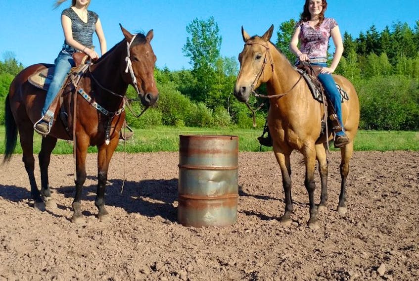 Courtney, left, and Julia Parker of West Branch are ready to compete in the Maritime Barrel Racing Association’s Jackpot this weekend at the Pictou Exhibition grounds on Saturday and Sunday. 