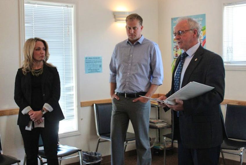 Nova Scotia Health and Wellness Minister Leo Glavine, right, announces a new nurse practitioner at the Westville Medical Clinic, one of new 23 nurses offering primary care in the province. Also pictured is nurse practitioner Marla MacDonald, left, and Dr. Aaron Smith.
