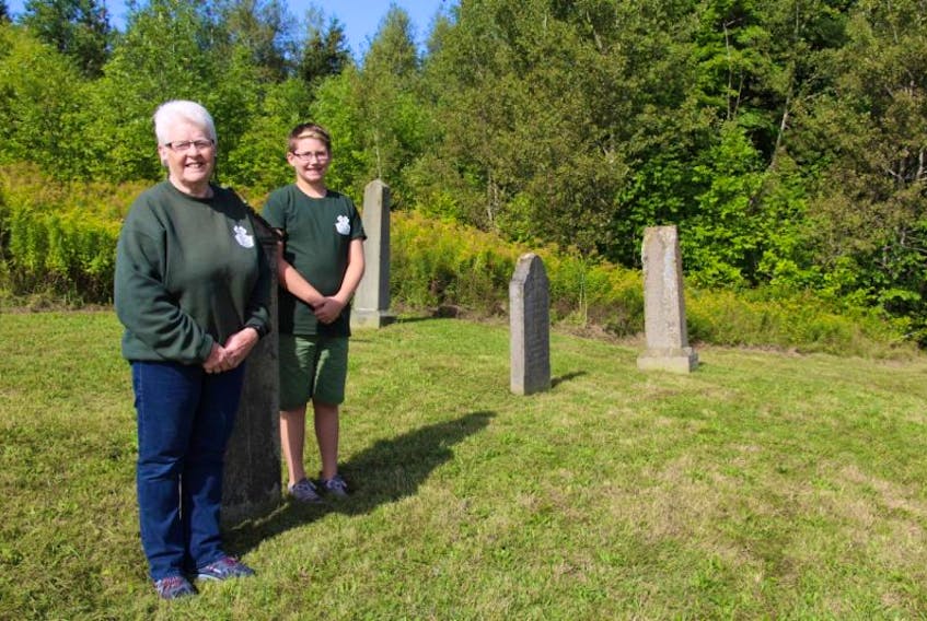 Salt Springs 4H leader Betty Lou Scott and Jaykus Rushton, a member of the club, are involved in the maintenance of the Ebenezer Cemetery. Rushton and his family mow the grass in the summer months as community service by the 4H club. 