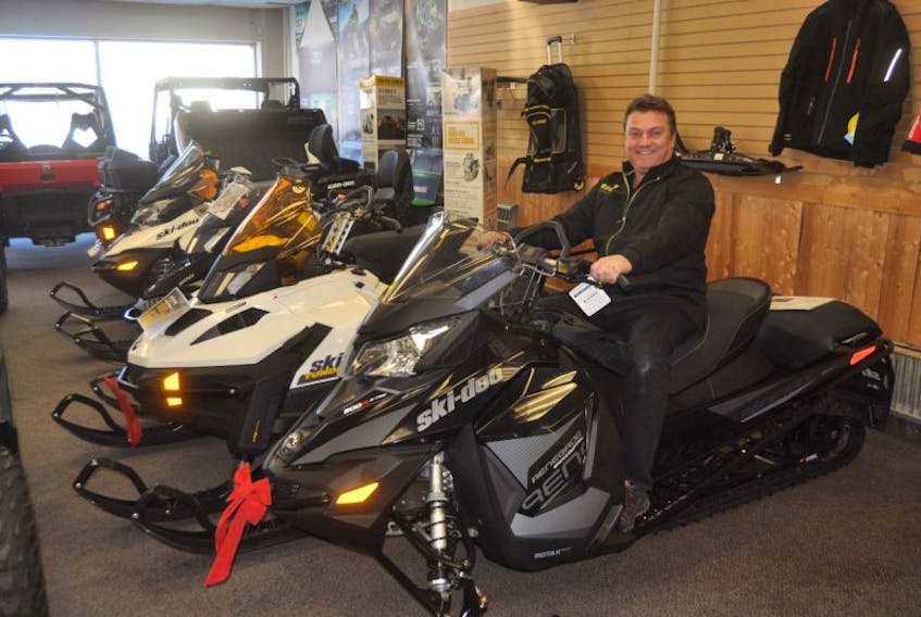 Kevin Crawford sits on a snowmobile at Adventure Motors in New Glasgow. He loves getting out on the weekends to enjoy time with friends and spend time in nature.