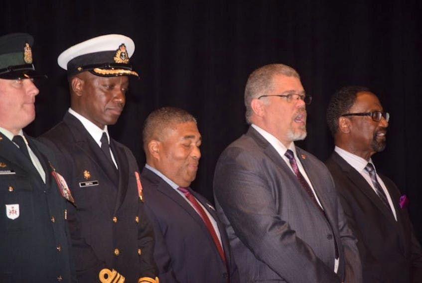 Pictured from left is Canadian navy Lt.-Commander Paul A. Smith, Tony Ince, MLA for Cole Harbour-Portland Valley and Minister of African Nova Scotian Affairs, Doyle Safire of Veteran’s Affairs Canada and Douglas Ruck, son of the late Senator Calvin Ruck, whose 1987 book The Black Battalion 1916-1920: Canada’s Best Kept Military Secret brought the Battalion’s efforts to the forefront.