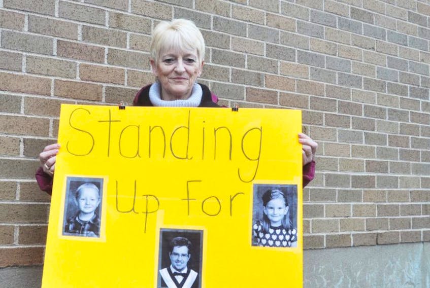 Cindy-lee MacLean shows her support for students caught in the middle of a labour dispute between teachers and the province in this photo taken last month.