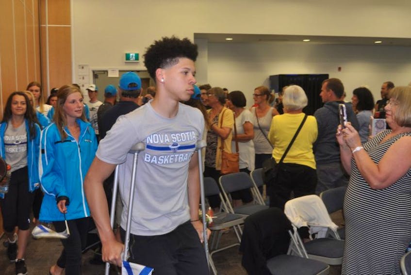A sendoff for the 16 athletes from Pictou County competing in the Canada Games in Winnipeg was held Monday night at the Pictou County Wellness Centre. Here people in the audience applaud as the athletes enter the room.