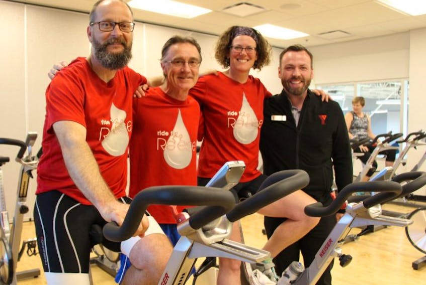 Lloyd McLean, left, and Andrea Haughan, second from right, have been training at the Pictou County YMCA under the instruction of spin class leader Merton Arbuckle, centre. YMCA CEO Jim Pomeroy is a supporter of the couple’s Ride for Reese and their training at the Pictou County YMCA. 