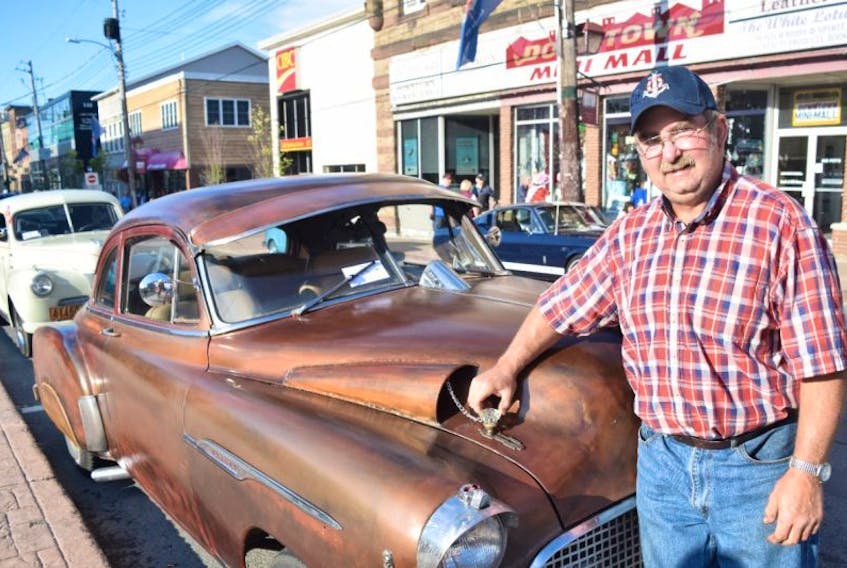 Finley MacDonald of Pictou is shown with his 1952 Chevy Business Coupe.