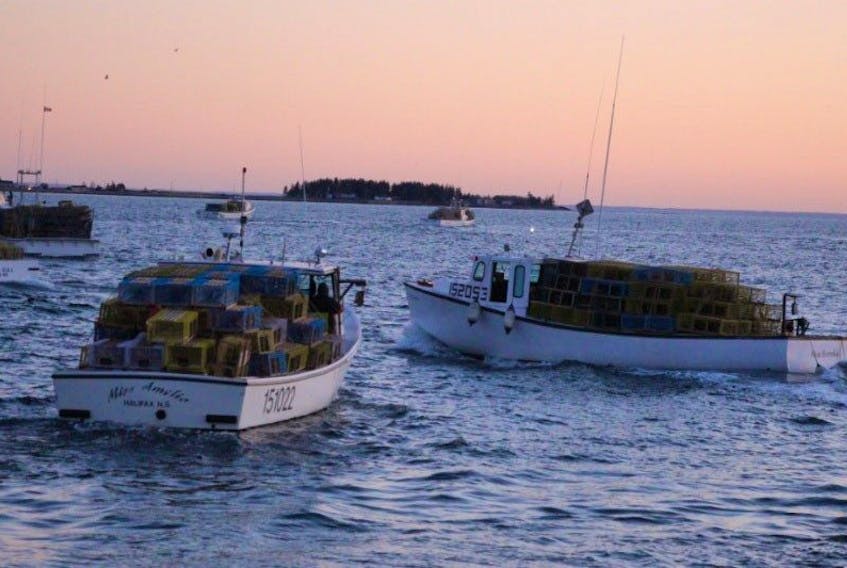 Fishing boats head out for the season opening in this file photo.