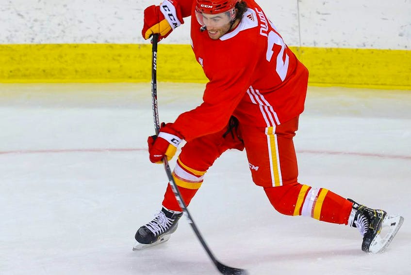 Dillon Dube participates in Calgary Flames training camp at the Saddledome in Calgary on Jan. 9, 2021.  