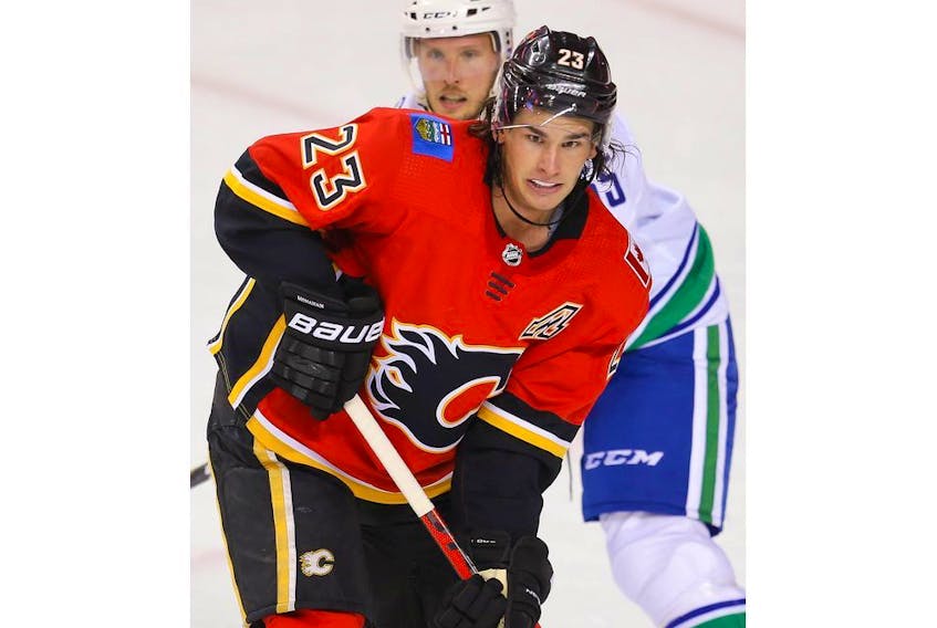 Calgary Flames Jakob Pelletier during warm-up before facing the Vancouver Canucks during pre-season NHL hockey in Calgary on Monday September 16, 2019. Al Charest / Postmedia