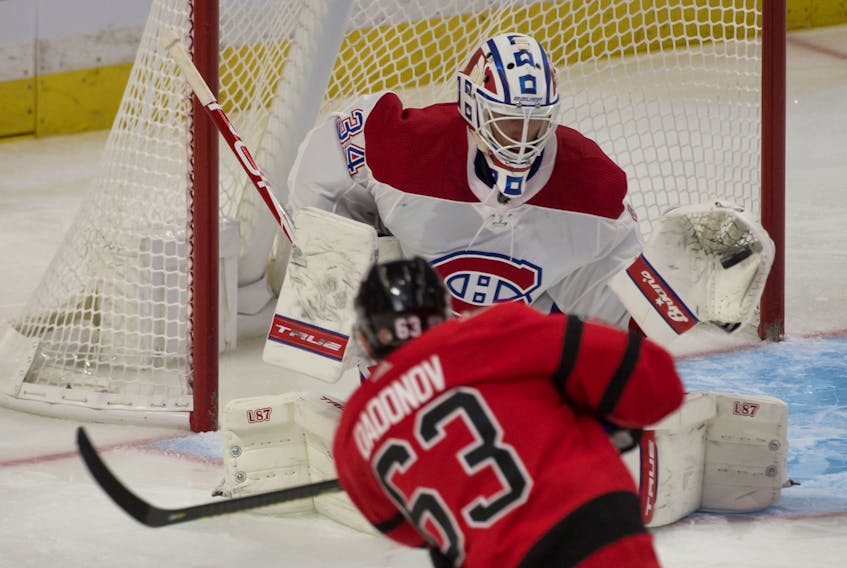 Montreal Canadiens goalie Jake Allen makes a save on a shot from Ottawa Senators forward Evgenii Dadonov in a recently game in Ottawa.   
