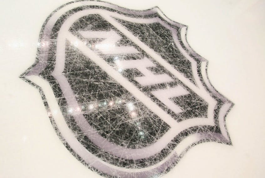 File photo of the NHL logo on the ice.