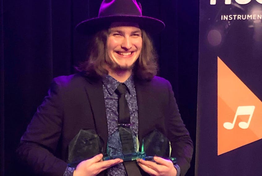 Nick Earle with his three MusicNL Awards after Tuesday night’s ceremony in St. John’s. CONTRIBUTED PHOTO