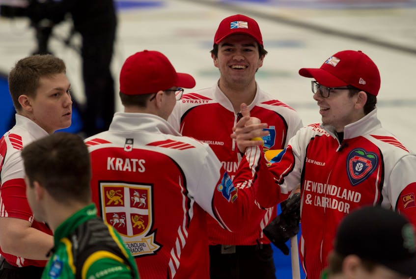 The Newfoundland and Labrador rink of (from left) Ryan McNeil Lamswood, Joel Krats, Nathan King and Daniel Bruce got to celebrate a win over Saskatchewan in a Saturday semifinal at the Canadian junior men’s curling championship in Langley, B.C., but the Bruce-skipped team lost to another Prairie Province team in Sunday’s final, dropping a 9-6 decision to Manitoba. — Michael Burns/Curling Canada
