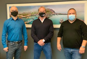 Quinlan Brothers Ltd. did a deal recently with St. John's-based PFS Health Tehnologies, for technology to improve air quality at its fish processing plants. Left to right are: Gerry Riggs of PFS, Robin Quinlan of Quinlan Brothers Ltd. and Des Walsh of PFS.