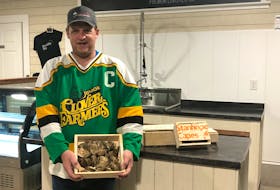 Robbie Moore proudly wears his Tyne Valley Clover Farmers’ junior C hockey jersey. Moore and his partner, Kendra Mills, operate Brackley Bay Oyster Company, and they are donating 100 per cent of oyster sales on Friday and Saturday to the Tyne Valley rink rebuild committee. Moore, who grew up on the Northam Road, played minor hockey out of the Tyne Valley Community Sports Centre. The Brackley Bay Oyster Company is located at 802 MacMillan Point Rd. in West Covehead and is open from 11 a.m. to 6 p.m., Friday, and 11 a.m. to 4 p.m., Saturday.