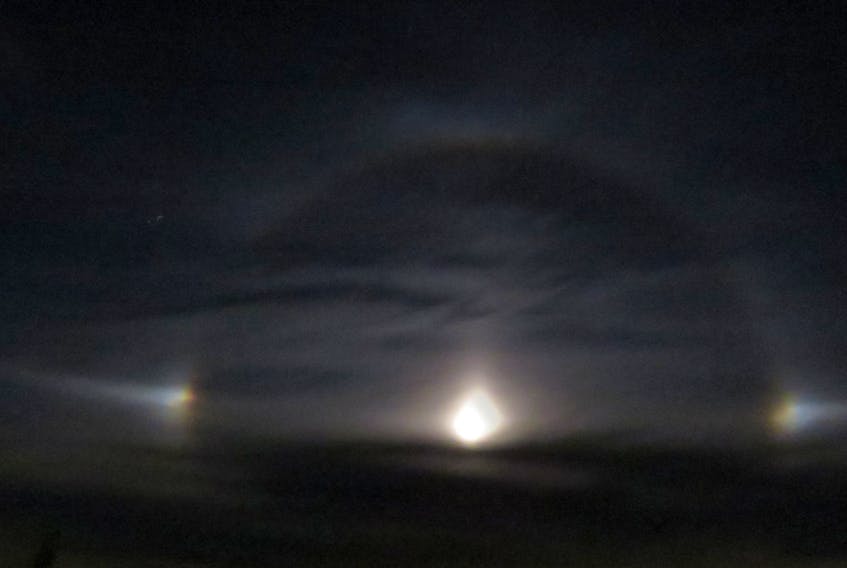 Trish and Randy Toll submitted this stunning photo of moon dogs.  They were treated to the spectacle last Friday evening on Grand Manan Island N.B.