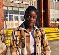Lemuela Ajuwon, 15, stands outside Sydney Academy the day after her and other students successfully petitioned the school advisory council to make changes to the dress code. NICOLE SULLIVAN/CAPE BRETON POST 
